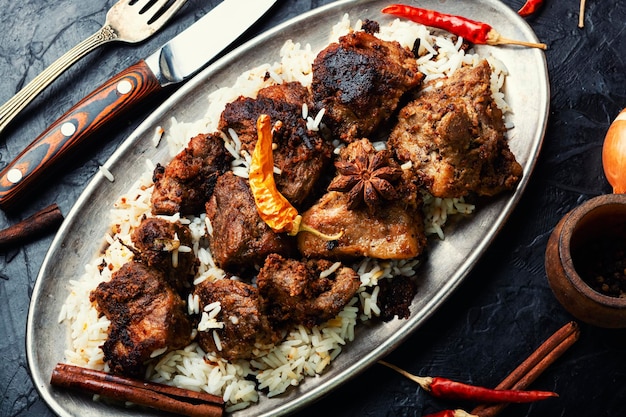 Vinegar marinated pork braised in Indian spices vindaloo