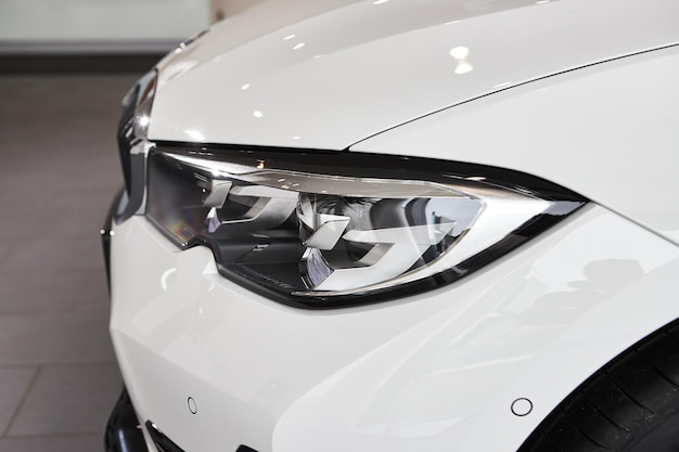 Vinnitsa Ukraine February 24 2021 Headlight of BMW Series 3 new model car presentation in showroom