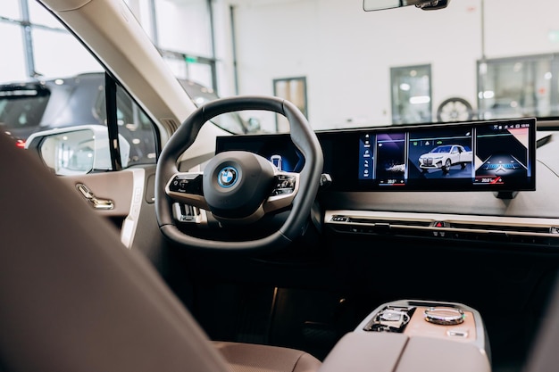 Vinnitsa ukraine january 14 2022 bmw ix new model allelectric\
suv car presentation in showroom interior inside