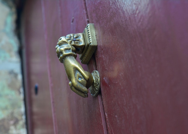 Vinous old door with doorknocker