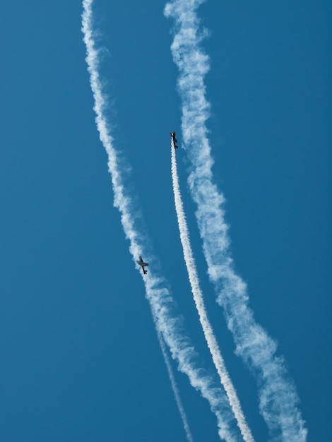 Vintage airplane flying in formation at the Rocky Mountain Airshow in Broomfield, Colorado.