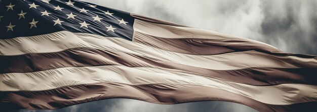 A vintage American flag on a background of clouds banner