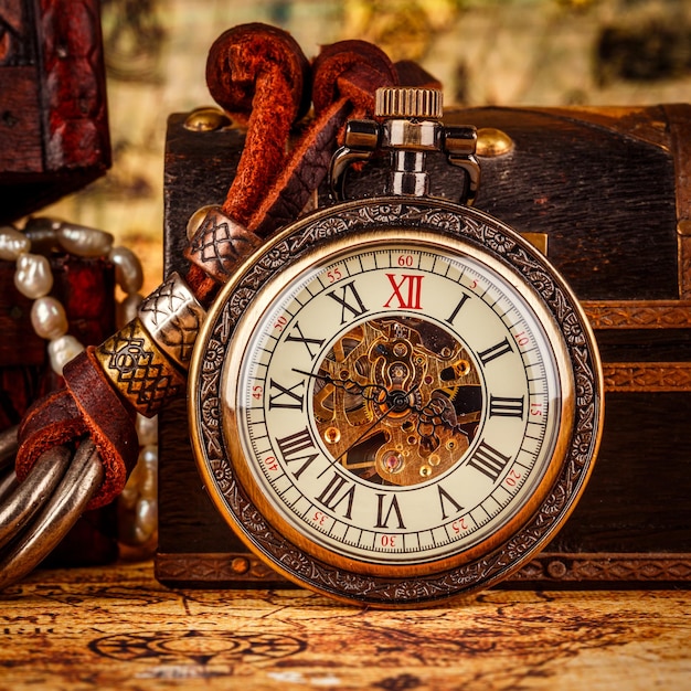 Vintage Antique pocket watch. Vintage grunge still life.