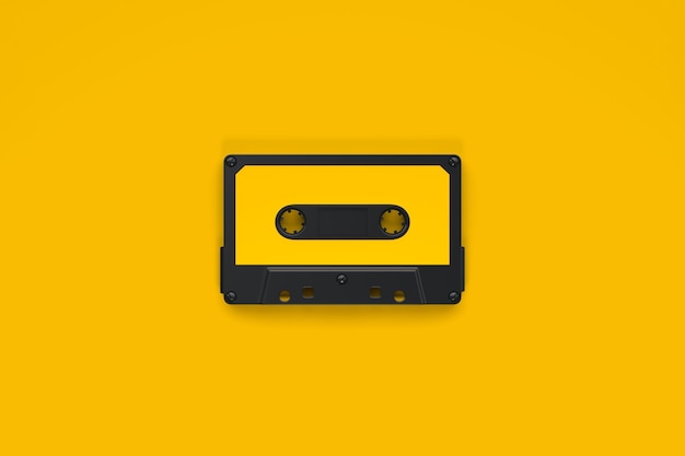 Vintage audio tape cassette on a yellow background top view with copy space 3d render illustration