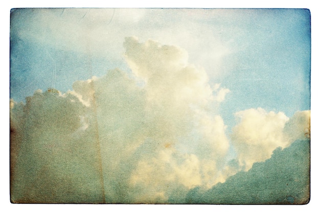 Vintage background in the blue sky with clouds