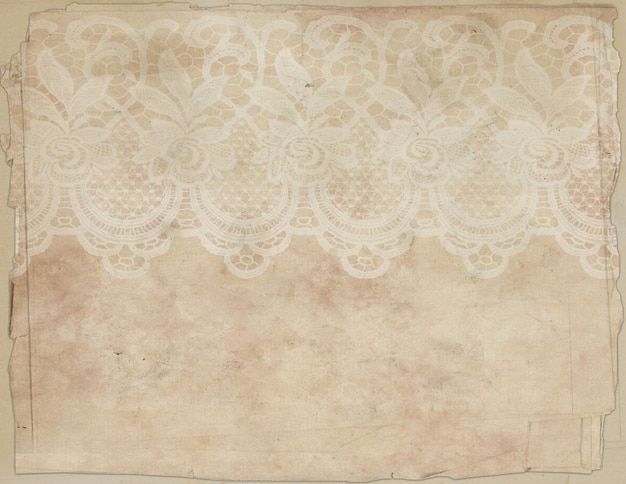 Винтажный фон с кружевным узором Текстура старой бумаги с кружевом