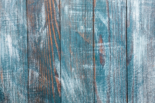 Photo vintage blue wood background texture with knots and nail holes