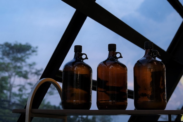 Vintage bottles for decoration in room Sky as background