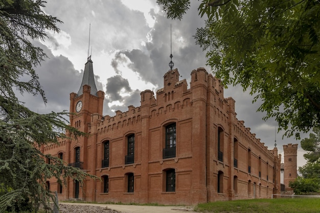 Vintage brick building with a square tower