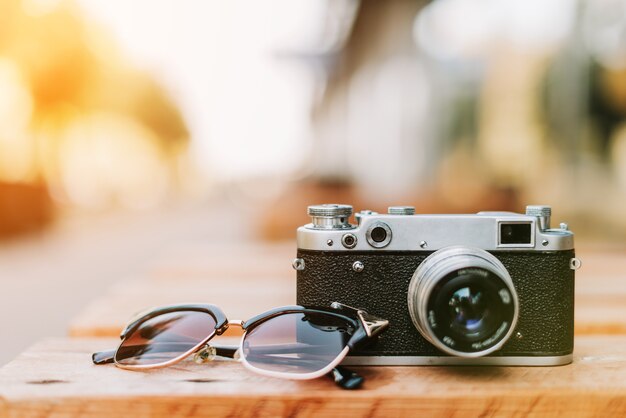 Vintage camera on a wooden surface