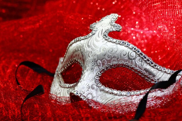 Vintage carnival mask in red background