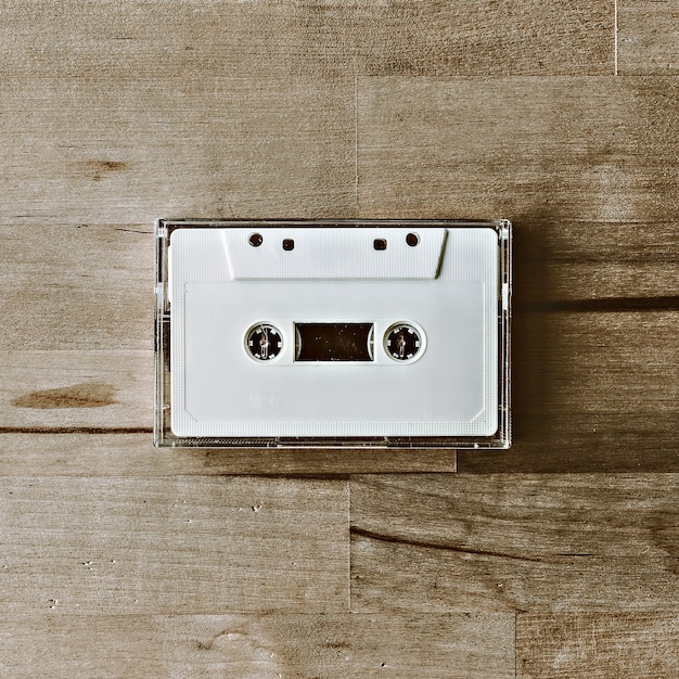 Vintage cassette on wooden background