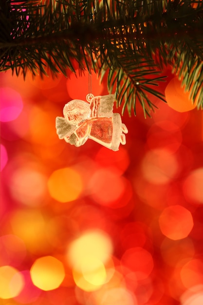 Vintage Christmas Angel against light blurred background