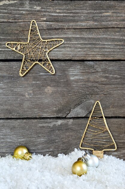 Vintage Christmas decorations on a background of old gray wood