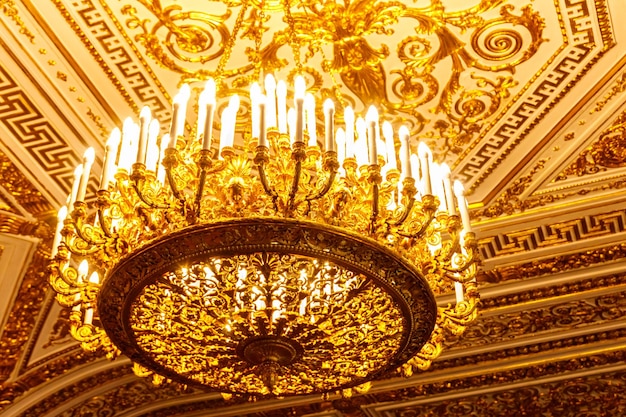 Vintage classical chandelier hanging under a ceiling