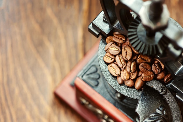 Vintage coffee grinder and coffee beans