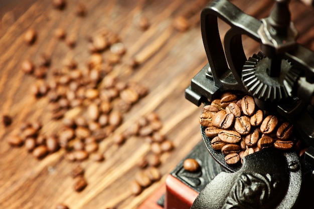 vintage coffee mill and coffee grains