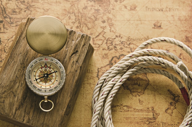 Photo vintage compass on old map