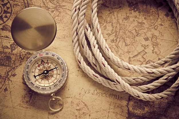 Vintage compass on old map