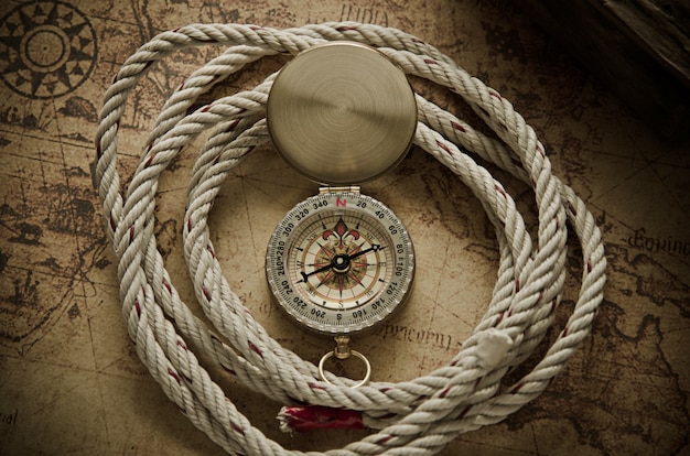 Vintage compass on old map