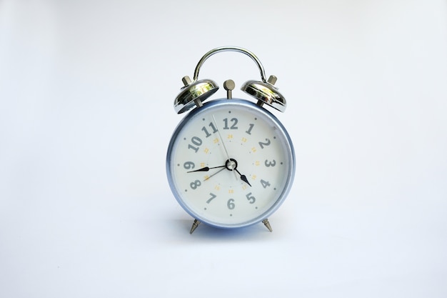 Vintage Copper Alarm Clock is located on a white desk loud Made of steel