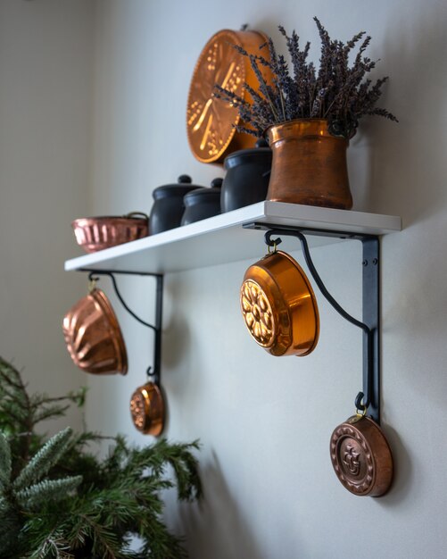 Vintage copper baking molds as wall decorations. 