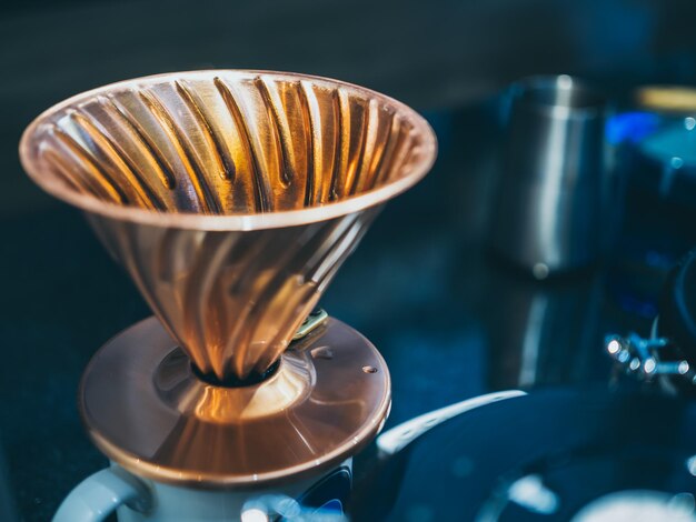 Photo vintage copper coffee dripper