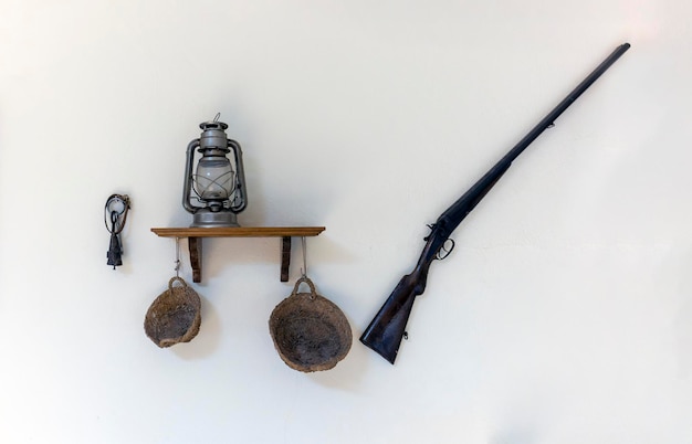 Vintage decoration on the wall with field and hunting objects