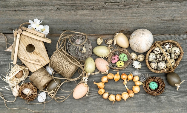 Vintage decoration with eggs and flower bulbs. nostalgic easter still life home interior. wooden background