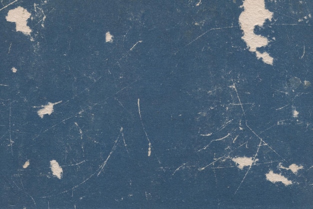 Vintage en oud uitziende papieren achtergrond met een beschadigde grunge textuur