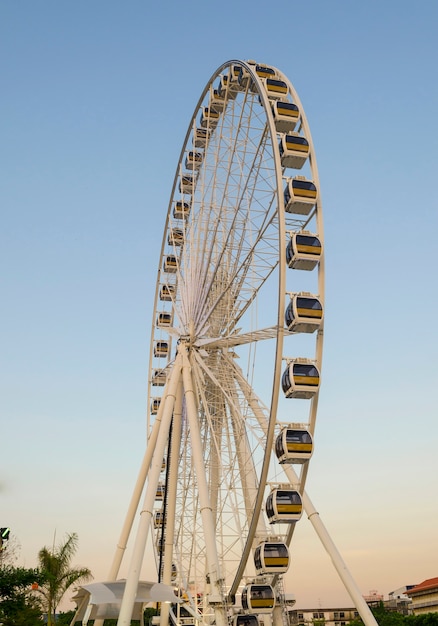 Vintage ferris wheel over turquoise sky