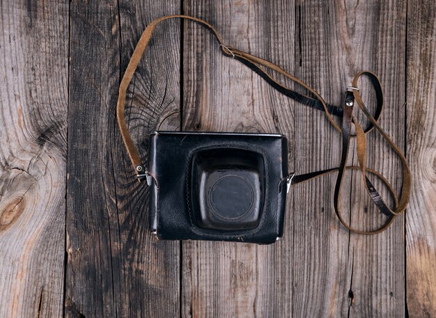 Vintage film camera in a leather case