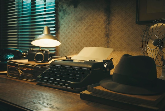 Vintage film noir office desk with old typewriter