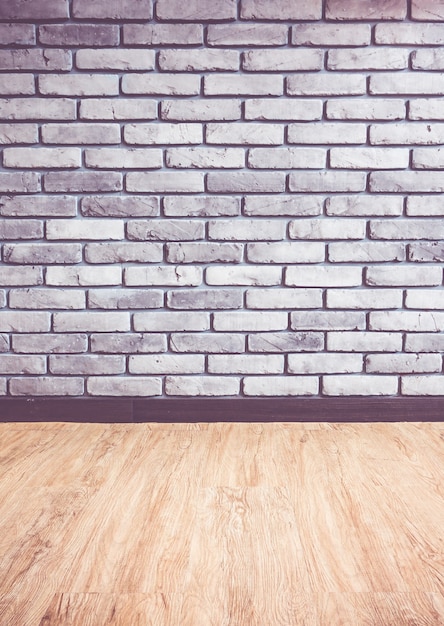 Vintage filter: Empty interior perspective with grey brick wall and wood parquet