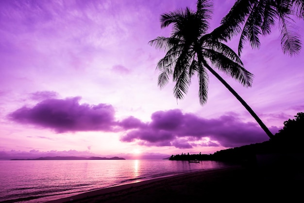 vintage filter sunrise over tropical beach island and sea