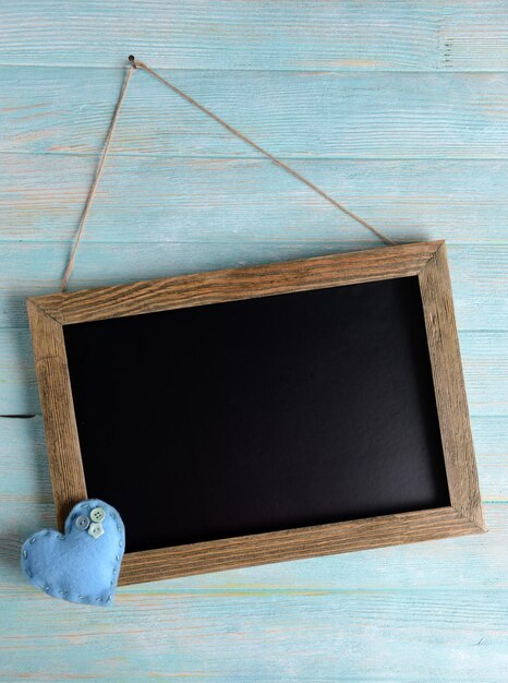 Vintage frame on wooden background