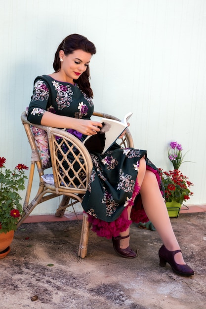 Vintage girl reading a book