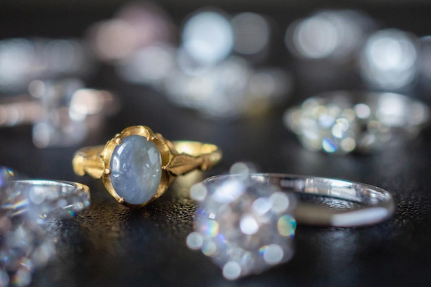 Vintage gold Jewelry blue sapphire and diamond ring on black background