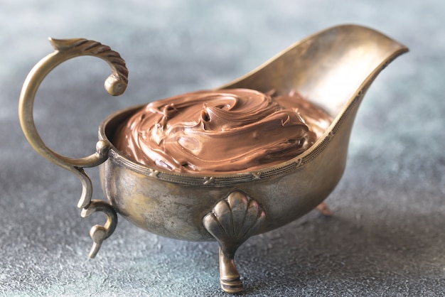 Vintage gravy boat with chocolate cream