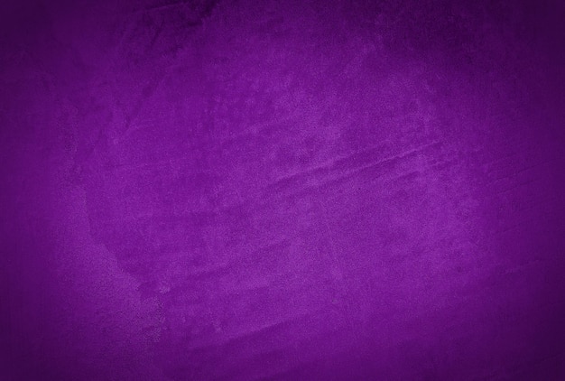 ビンテージ グランジ紫色のコンクリート テクスチャ スタジオの壁の背景にビネット