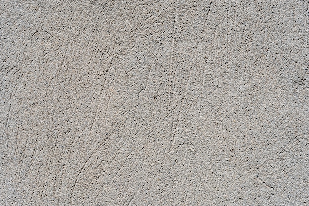 Винтажный шероховатый узор на цементной стене.
