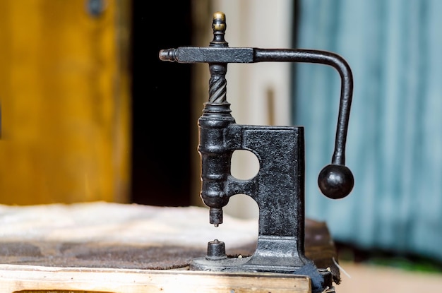 Vintage handpress for setting rivets on clothes The shoemaker39s workshop