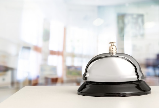 Vintage hotel reception service desk bell.