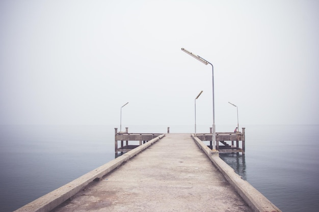 Vintage image of pier concrete bridge to the sea