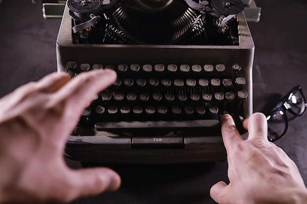 Photo vintage journalist tool. typewriter retro. the writer is at work. seal of the novel. journalist writer concept.