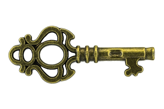 Фото Старинный ключ старинный золотой ключ на белом фоне обтравочный контур