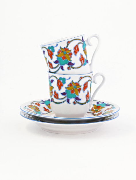 Vintage koffieset met kleurrijke decoratie geïsoleerd