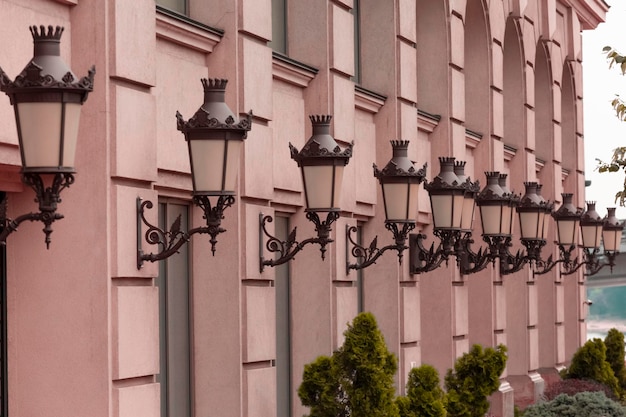 Vintage lanterns on old houses in a European city