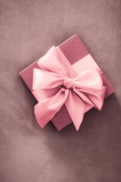 Vintage luxury holiday blush pink gift box with silk ribbon and bow christmas or valentines day decor