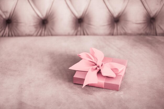 Vintage luxury holiday blush pink gift box with silk ribbon and bow christmas or valentines day decor